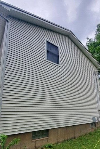House siding bright and clean after a soft wash